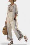 Tameric | Blusa cruda bordada sofisticada y pantalones anchos
